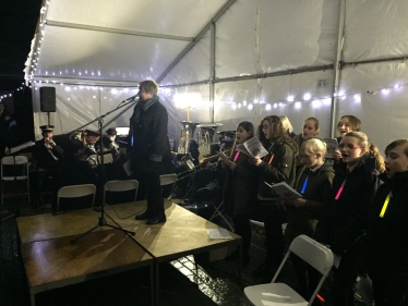 Sir David took part in carol singing in Leigh